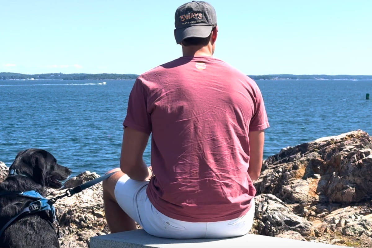 North Shore roast beef culture at Marblehead’s Chandler Hovey Park with a boy and his dog overlooking the ocean in Beef Country.