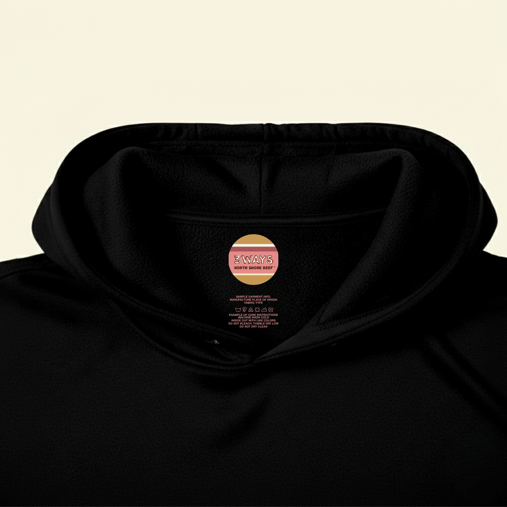Neck view of the black micro fleece hoodie showing the custom printed label sample
