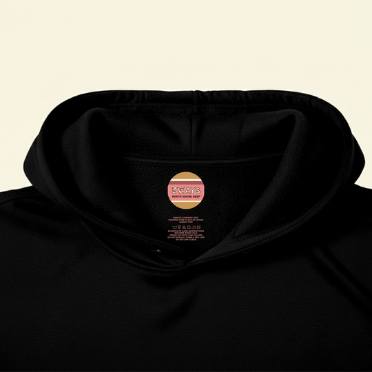 Neck view of the black micro fleece hoodie showing the custom printed label sample