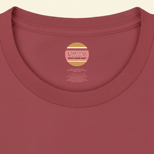 Neck view of the crimson t-shirt showing sample custom printed label