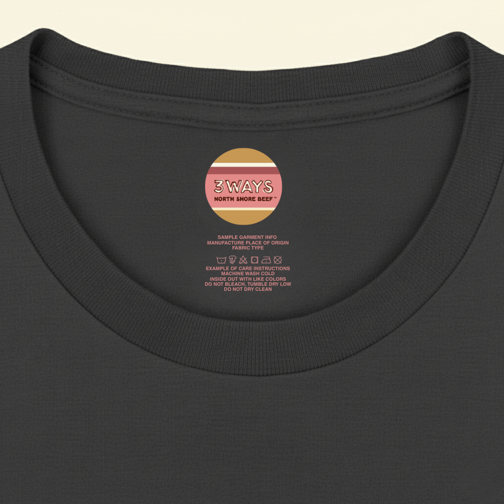 Neck view of the long sleeve black shirt showing a sample custom printed label